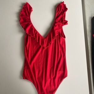 red bodysuit